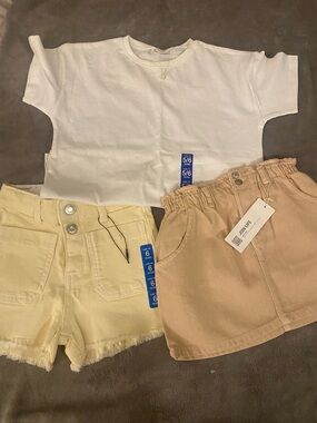 Zara Kids White Tee with Tan skirt and yellow Shorts